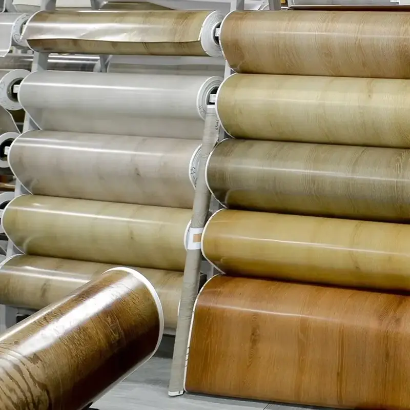 WPC තට්ටු මත ලැමිෙන්ට් කිරීම සඳහා PVC වර්ණ අලංකරණ චිත්‍රපට: ඒවා ඔබේ බිම් මහල සඳහා ක්‍රීඩාව වෙනස් කරන්නෙකු වන්නේ ඇයි?